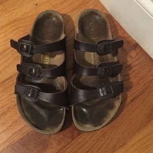 Birkenstock three strap sandals.