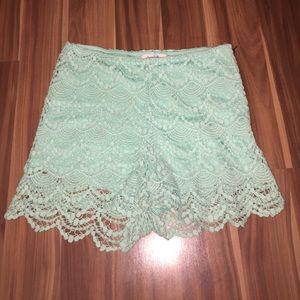 Teal lace shorts with zipper on side