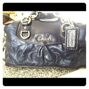 Coach embossed leather barrel bag