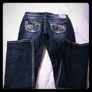 Silver jeans with the worn out front look