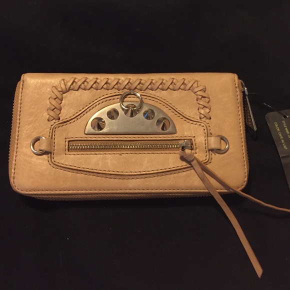 Sam Edelman zip around wallet: 12 cc slots.
