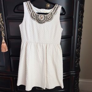 Cream dress with gold sequin mech details