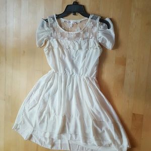 Cream, ruffled dress