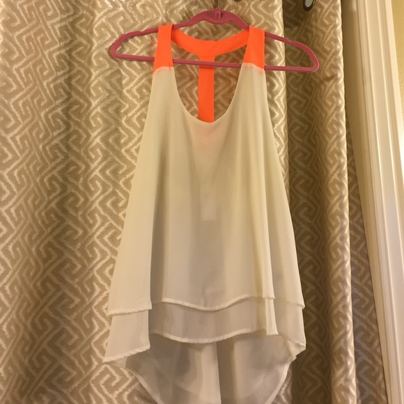 tank with orange straps