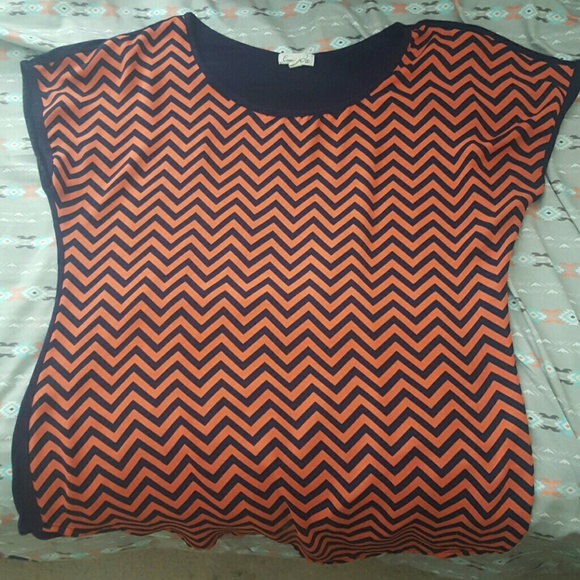 Orange and navy blue patterned top