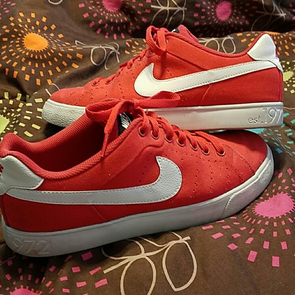 Red Nikes, men's size 8.5