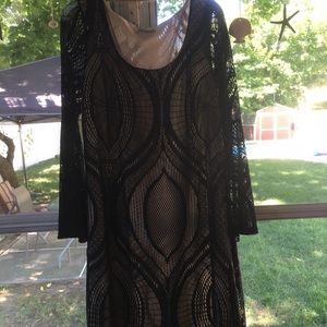 Beautiful & Very flattering dress.