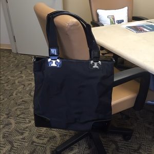 Black Tory Burch purse.