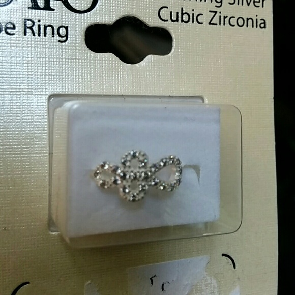 silver cross toe ring