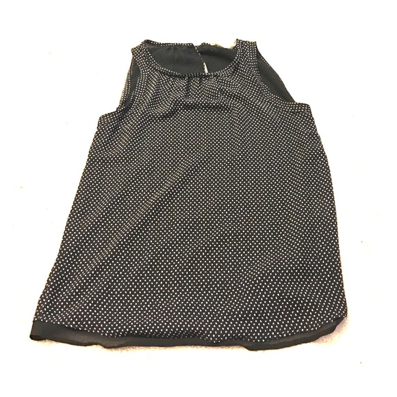 Black blouse with beige polka dots