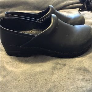 Women's navy blue dansko clog shows