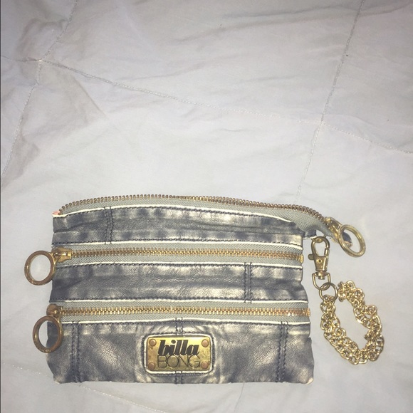Billabong wristlet.  Light blue leather with gold.