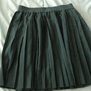 Green mini pleated skirt.