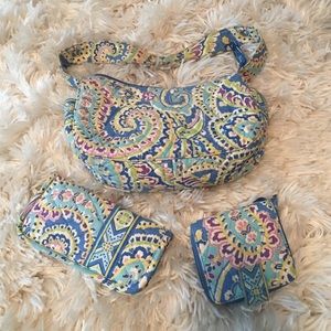 Vera Bradley purse, wallet and glasses holder.