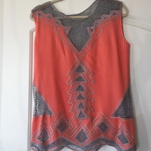 Jen's Pirate Bootie mesh trimmed tank.