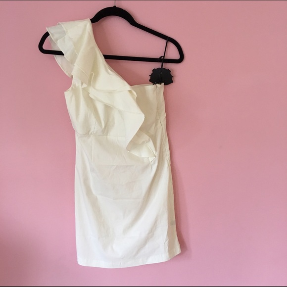 All white dress. One shoulder. fitted
