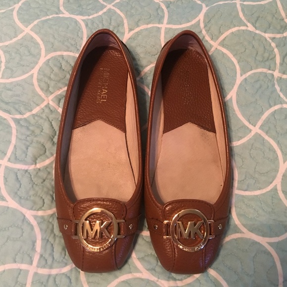 Micheal Kors brown leather flats. Size 7