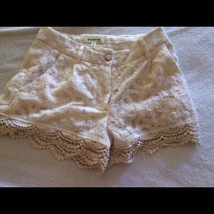 cream colored lace shorts
