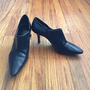 Nine West Black pointy toed heels.