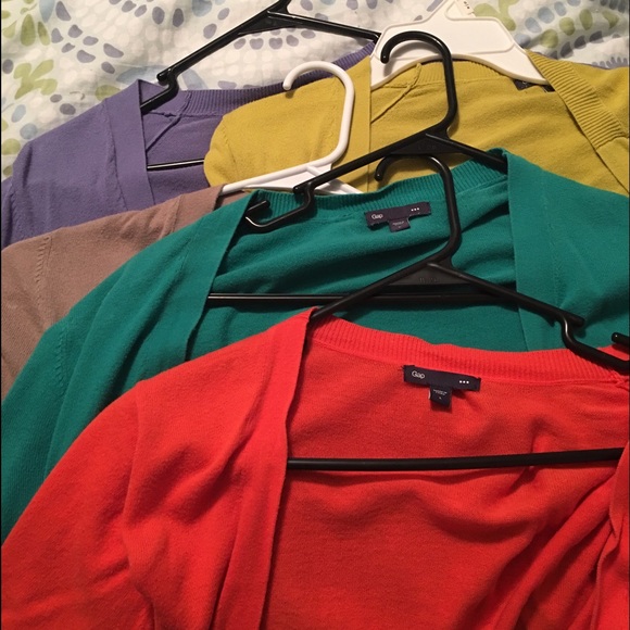NEW.  4 GAP cardigans. Size Large.