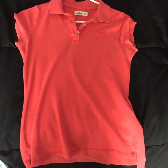 Salmon/red collared shirt
