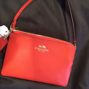 Brand new Coach wristlet