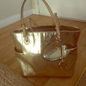 Michael Kors Monogram Gold handbag