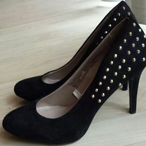Black studded pumps