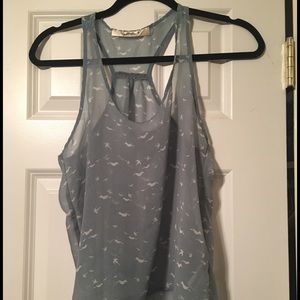 Sheer pale blue tank