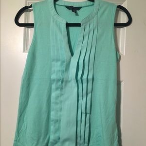 Blue sleeveless blouse