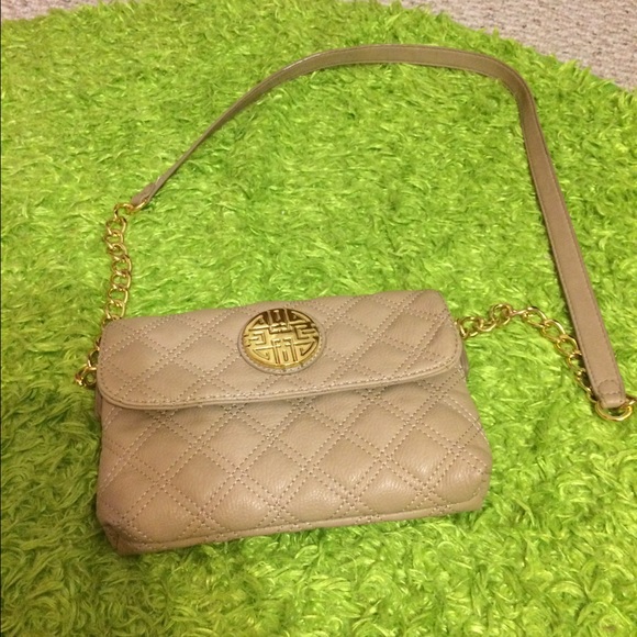 Tan over the shoulder purse with gold strap