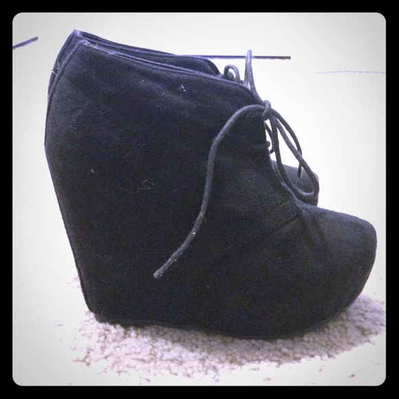 Black suede wedges.