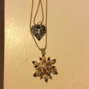 Gold toned snowflake winged heart
