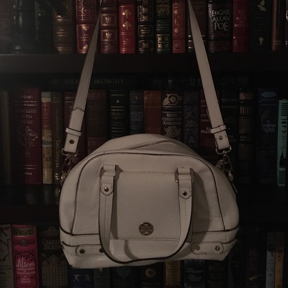 White Dana Buchman cross body purse.