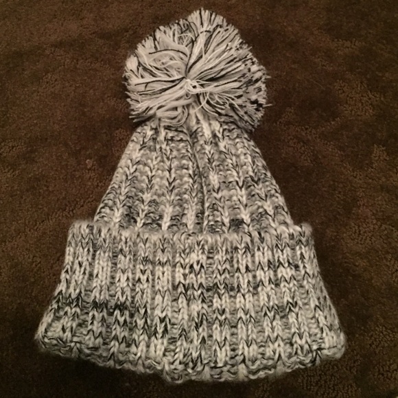 Knit gray and white hat with Pom Pom