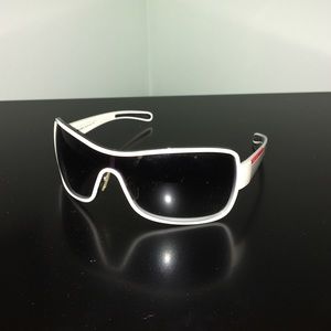 Prada white-framed sunglasses