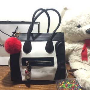 White and black smiley bag