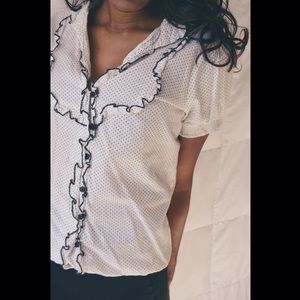White blouse with black polka dots