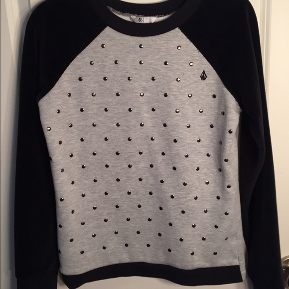 Brand new volcom sweater with velvet sleeves