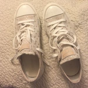 Gold polka dot Converse sneakers