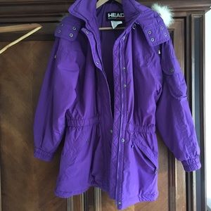 Purple winter puffer ski coat. Coyote Fur on hood
