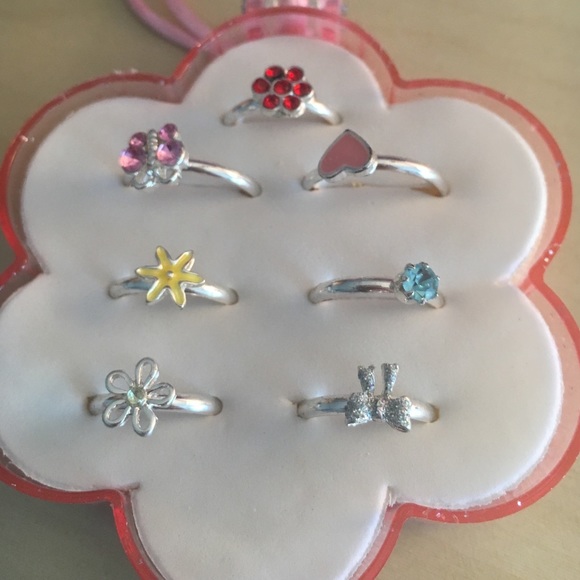 Assorted kids rings - case included