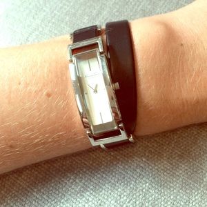 Kenneth Cole black leather wrap watch.