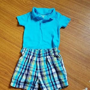 Polo onesie and shorts outfit.