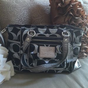 Black and silver coach bag