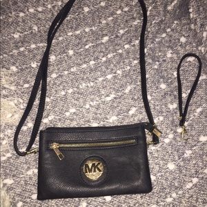 Michael kors body cross/ wristlet.