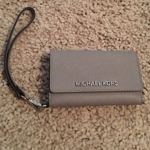 Michael Kors wristlet and phone case