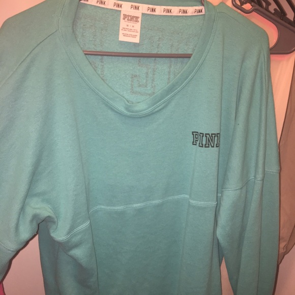 Turquoise pink sweater