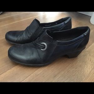 Women's black Clarks.