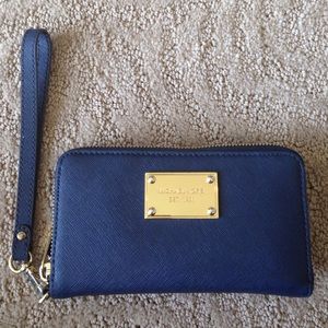 Navy blue Michael Kors wristlet/wallet